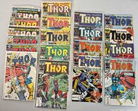 Front covers of all 19 Thor comics in sleeves