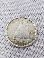 Reverse showing Bluenose schooner and date 1943