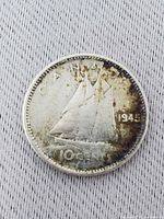Reverse showing Bluenose schooner, date and denomination