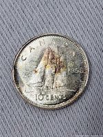 Reverse of 1958 Canadian dime showing Bluenose schooner, date, denomination