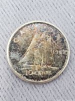 Reverse of 1963 Canadian dime showing Bluenose schooner and denomination