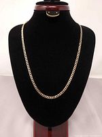 Full view of chain displayed on stand showing length and link style