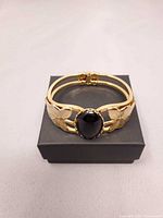 Full bracelet on box showing overall design