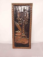 Front view showing entire copper plaque and relief design