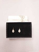 Earrings displayed in gift box, full view