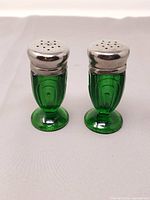 front view of both shakers standing upright