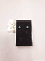 pair of pearl studs in gift box