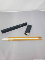 Slide rule and both parts of blue case overall