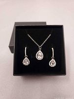 Necklace and earrings set in box showing overall appearance