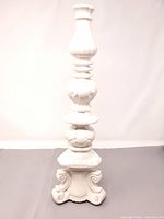 Full view tall white ceramic bottle vase