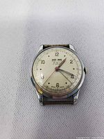Front view of ASU triple date wrist watch showing dial features and missing band