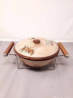 bean pot with lid on stand, full view