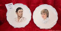 Front view of both commemorative plates side by side