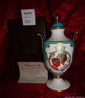 Front view of urn with box and certificate