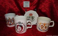 Group shot of three mugs and trinket dish showing fronts and relative scale