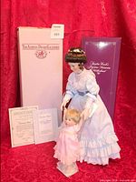 Full set with both dolls, certificates and boxes