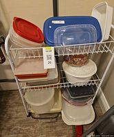 overview of wire shelf holding assorted containers and lids