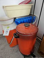 Group shot showing urn, cooler, plastic dishpan, enamel bowl, ice trays