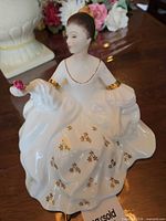 Front view of Royal Doulton My Love figurine showing gown details