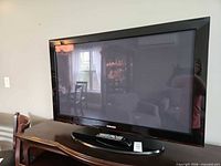 Front view of Samsung 42" plasma TV on stand