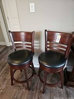 Both bar stools front view showing design and finish