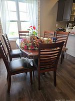 Table with six chairs around it