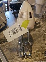 Front side of white Sunbeam Model 2485 mixer with attached beaters