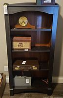 Front view showing overall bookcase, shelves, two-tone finish