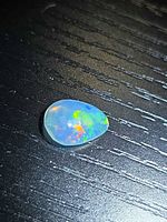 Front view of opal showing body colour and play-of-colour