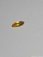 Marquise-cut yellow sapphire angled view