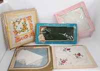 Group of five boxed vintage accessories