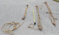 All three pulley and rope sets laid out beside tape measure for scale