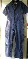 Full view of navy Big Bill coverall hanging
