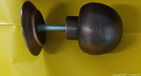 Single brass knob with threaded post and plate