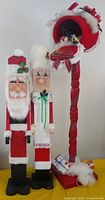 Front view of Santa, Mrs. Claus and mailbox stand together