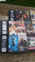 Assorted VHS tapes including Wonder Boys, The Saint, A Time to Kill and more