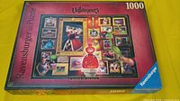 Closed box showing Ravensburger Disney Villainous Queen of Hearts 1000-piece puzzle artwork