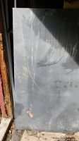 Full view of slate panel leaning against wall