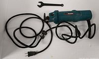 Makita 3706 drywall cut-out tool with cord and spanner wrench