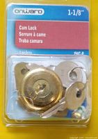 Front of packaged Onward cam lock showing brass finish, keys, size 1-1/8"