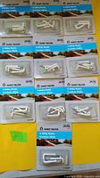 Full view of ten blister packages of Handy Helper 4 Utility Hooks