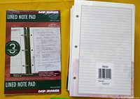 Front view of two Day Runner lined note pad packages (one showing front, one showing back barcode)
