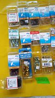 All blister-pack fasteners laid out for count and identification