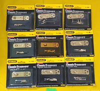 Front view of nine Stanley Classic Brassware hasp & hook packages