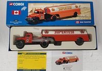 Box with diecast model, certificate and information pack visible