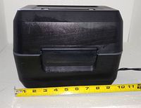 Front view showing exterior and tape measure for width