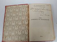 Front endpaper and title page showing series title, book title, owner inscription