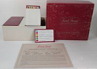 Overall view showing red Baby Boomer Edition box, internal tray with card boxes, instruction sheet, and category card
