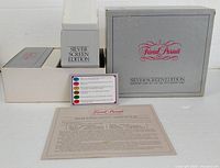 Full boxed set showing outer box, inner card boxes, category card and instructions