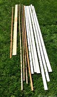 Full set of trim pieces laid on grass showing variety